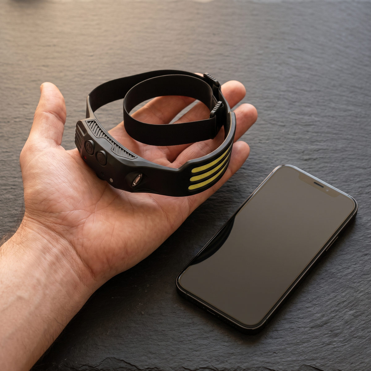 Halo 230 headlamp size compared with a smartphone