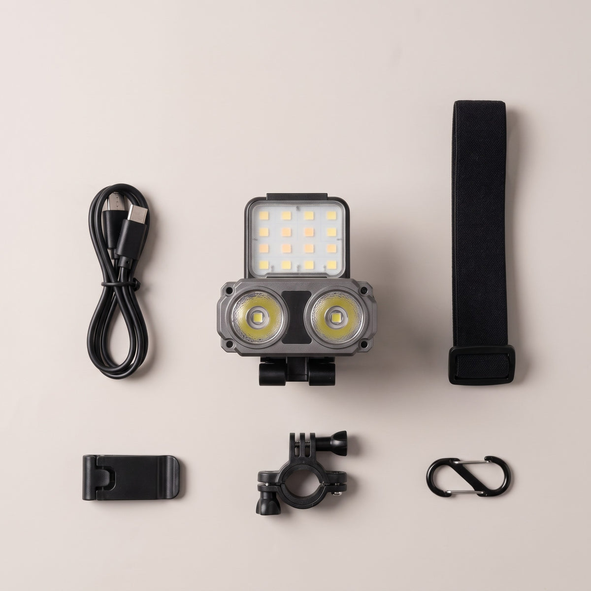 Warden Brim in the box: headlamp, USB-C cable, headband, cap clip, bike clip, carabiner
